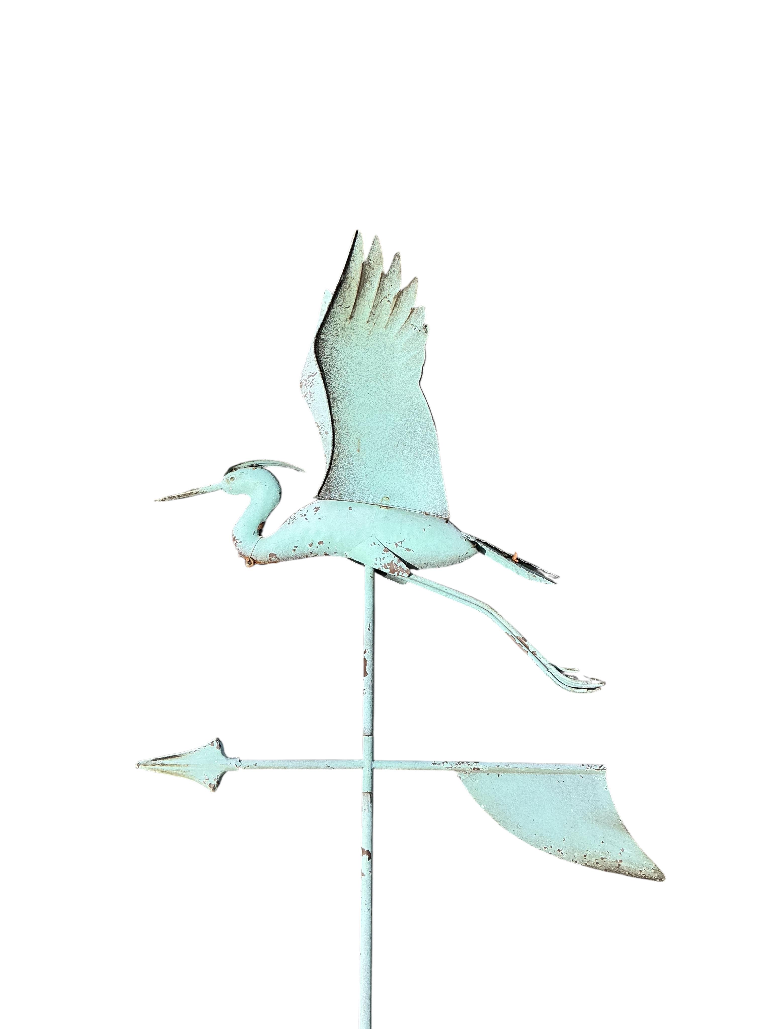 A metal stork weather vane, height 194cm